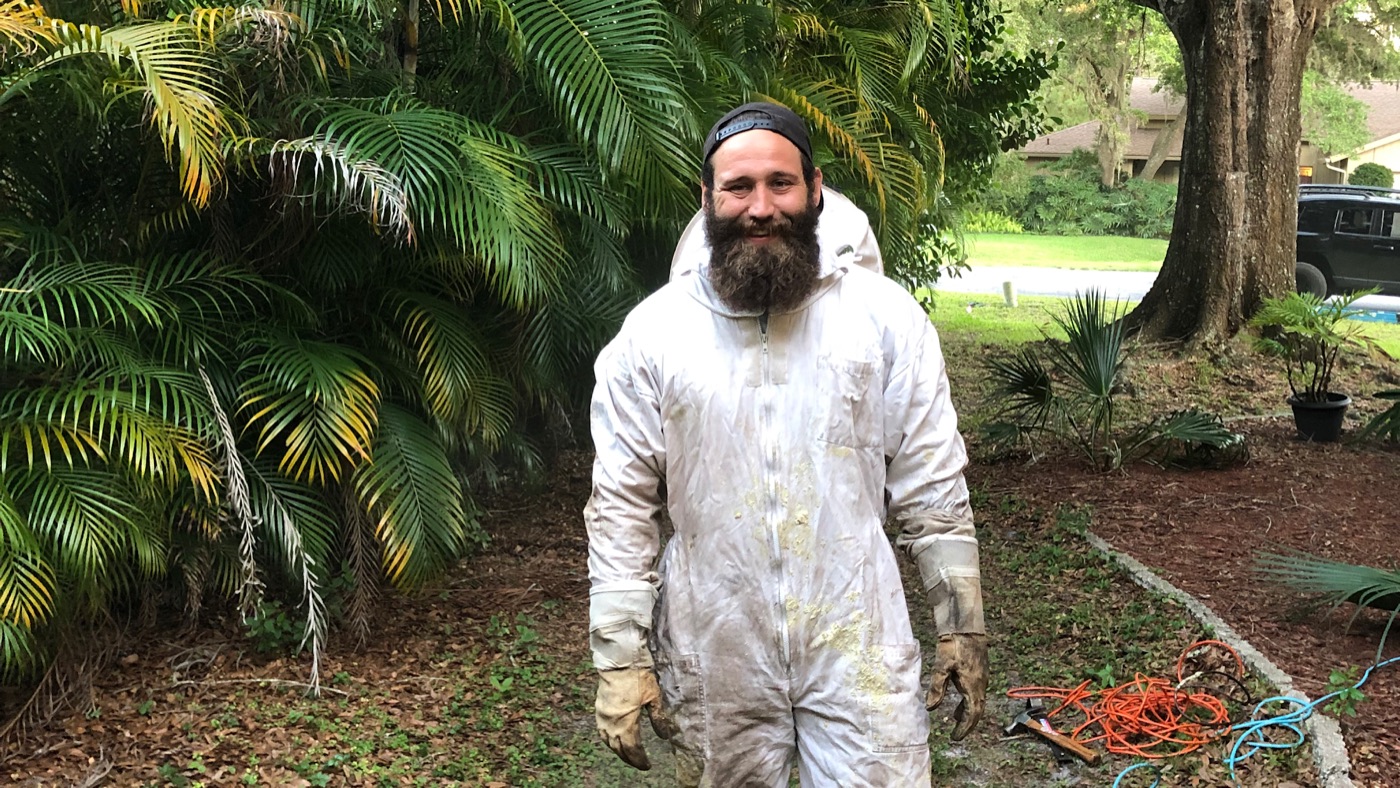 Sarasota Bee Removal technician in protective clothing.
